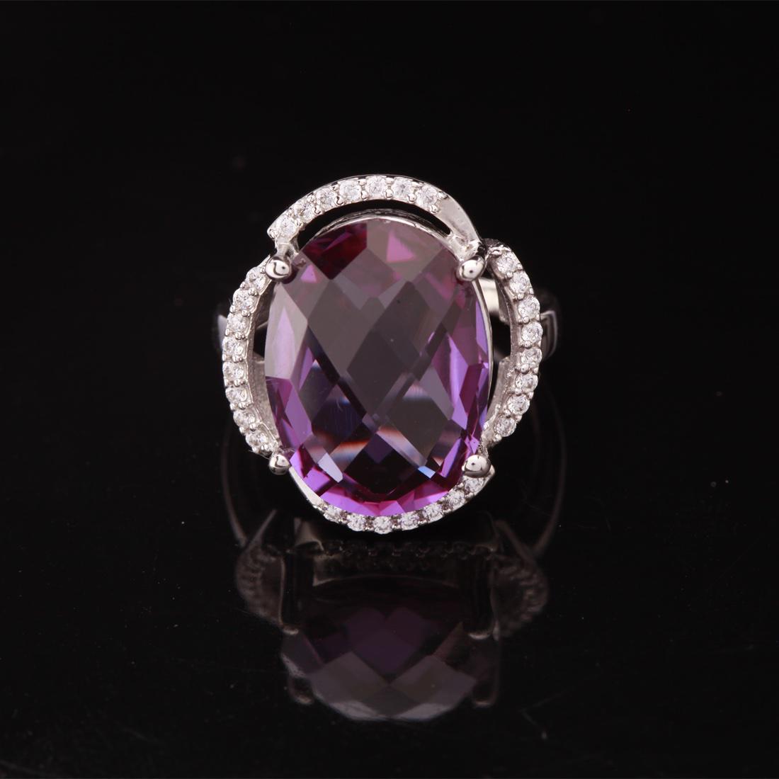 Sz 5.25 Sterling Slv Syn Alexandrite Zircon Ring: Sz 5.25 Sterling Slv Syn Alexandrite Zircon Ring • Metal: Sterling Silver • Stone: (1)16X12Mm-Syn Alexandrite & White Zircon • Width: 19.5 Mm • Total Weight: 5.85 Grs • F