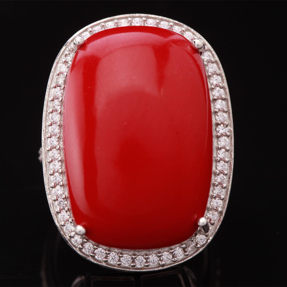 Size5.25 Sterling Cabochon Syn Coral & Zircon Ring: Size5.25 Sterling Cabochon Syn Coral & Zircon Ring • Metal: Sterling Silver • Stone: (1)24X16 Mm Syn Red Coral &White Zircon • Width: 27.9 Mm • Total Weight: 8.98Grs • Fi