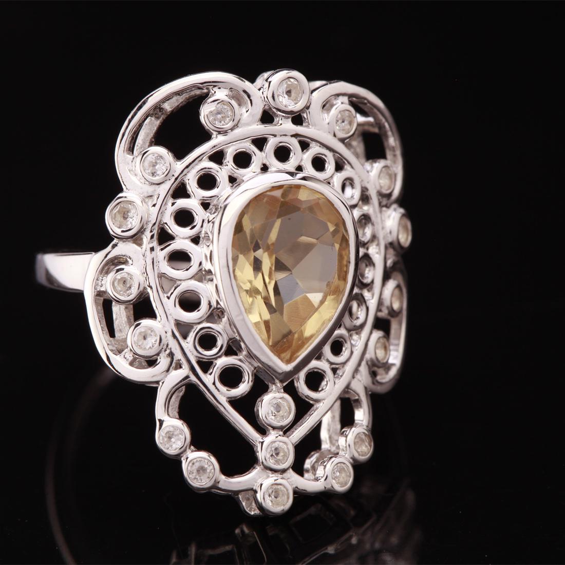 Sz 8 Bolivian Quartz & Zircon Sterling Slv Ring: Sz 8 Bolivian Quartz & Zircon Sterling Slv Ring • Metal: Sterling Silver • Stone: (1)10X8Mm-Bolivian Quartz &White Zircon • Width: 25 Mm • Total Weight: 4.69 Grs • Finish