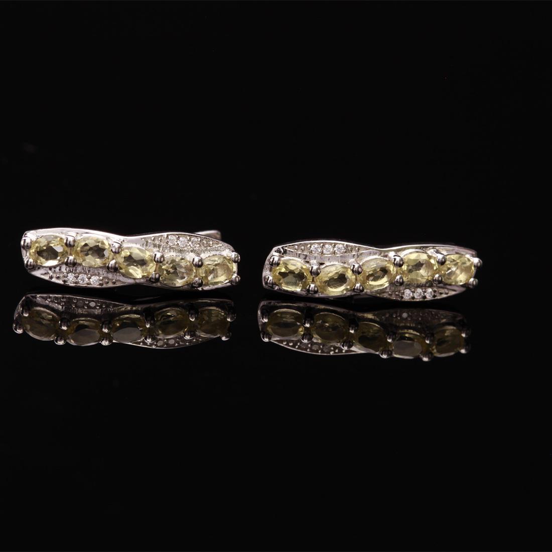 Sterling Silver Lemon Quartz & Zircon Earrings: Sterling Silver Lemon Quartz & Zircon Earrings • Metal: Sterling Silver • Stone: Lemon Topaz &White Zircon • Dimensions: 5.9X21.9 Mm • Total Weight: 5.04Grs • Backing: La