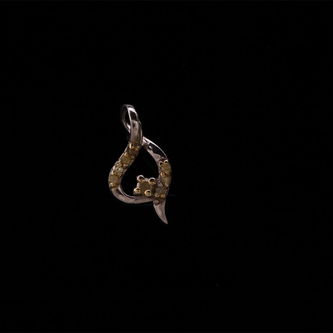 Yellow Diamond Sterling Silver Delicate Pendant: Yellow Diamond Sterling Silver Delicate Pendant • Metal: Sterling Silver • Stone: Yellow Diamond • Dimensions: 12.5X6.3 Mm • Total Weight: .25 Grs • Finish: Rhodium
