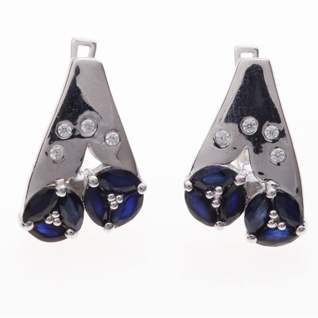 Sapphire & White Zircon Latchback Earrings: Sapphire & White Zircon Latchback Earrings .Metal: Sterling Silver .Stone: 5X2.5Mm Mq Blue Sapphire&Zircon .Dimension: 19.6X13Mm .Total Weight: 6.3 Grams .Finish: Rhodium .Backing: Latchback