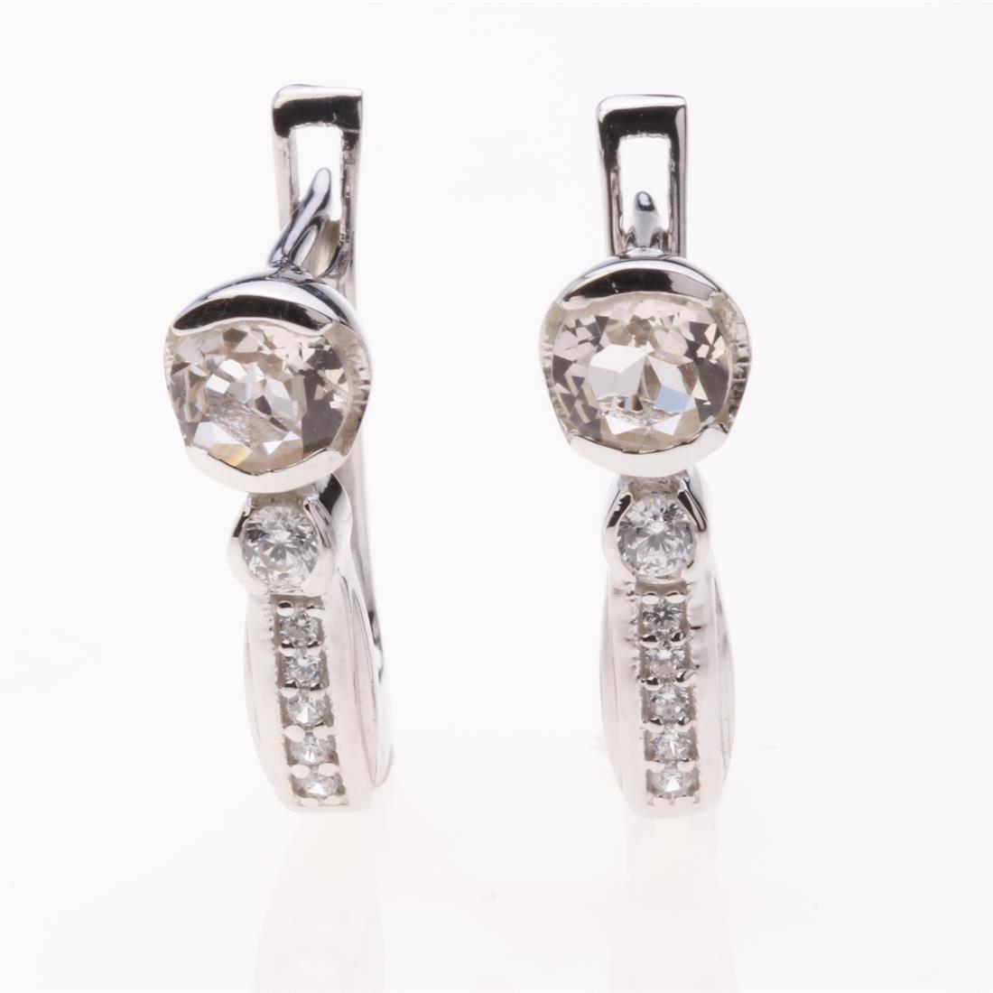 Pink Morganite & Zircon Latchback Earrings: Pink Morganite & Zircon Latchback Earrings .Metal: Sterling Silver .Stone: 5 Mm Rd Morganite&White Zircon .Dimension: 18.4X5.8 Mm .Total Weight: 3.33 Grams .Finish: Rhodium .Backing: Latchback
