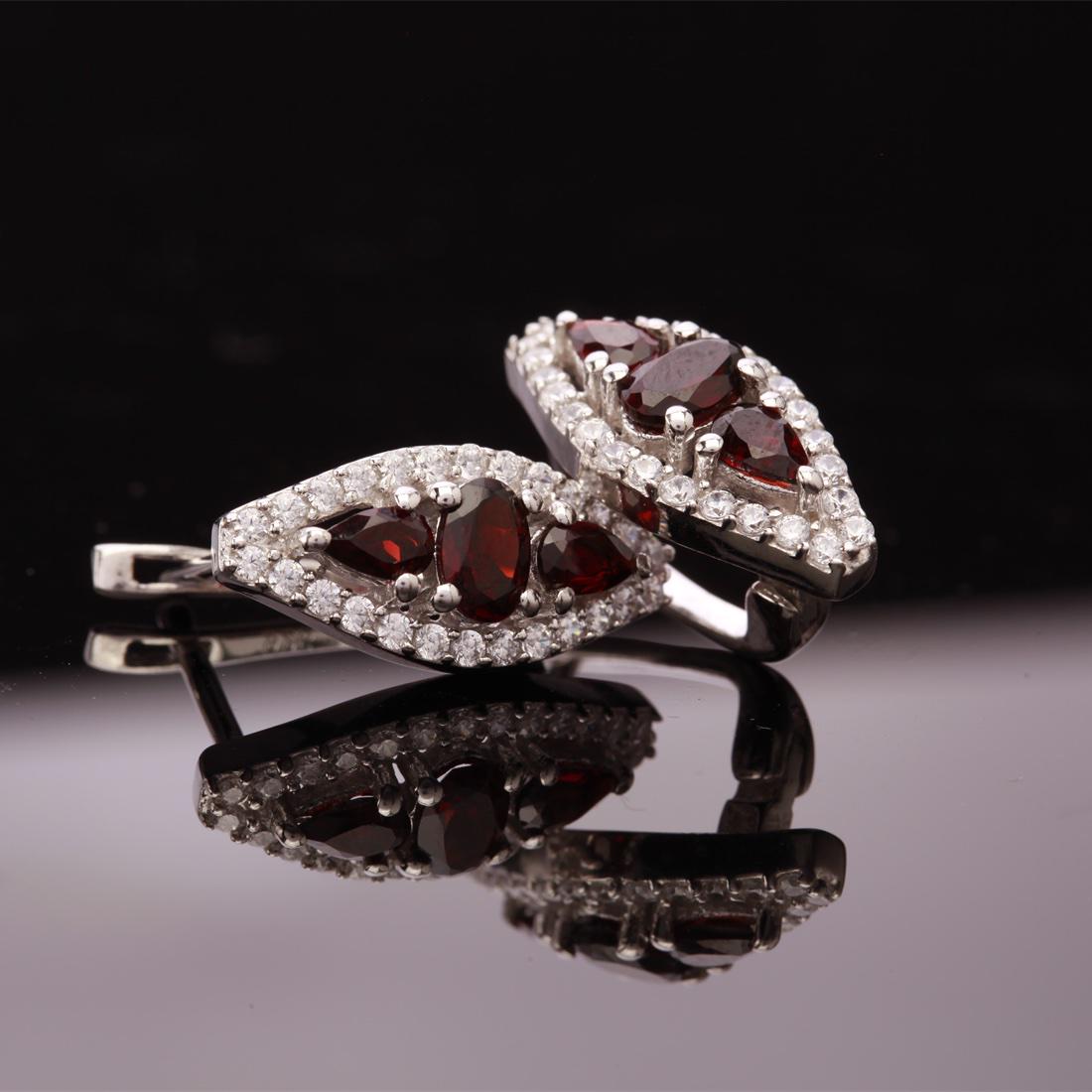 Sterling Silver Garnet & Zircon Latchback Earrings: Sterling Silver Garnet & Zircon Latchback Earrings • Metal: Sterling Silver • Stone: Garnet & White Zircon • Dimensions: 20.9X9.52Mm • Total Weight: 6.3 Grs • Backing: La