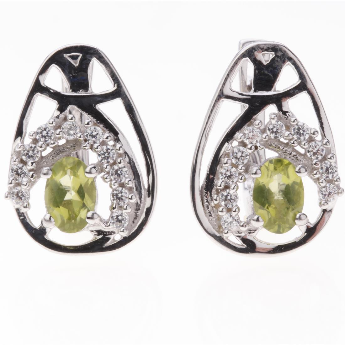 Peridot & Zircon Latchback Silver Earrings: Peridot & Zircon Latchback Silver Earrings .Metal: Sterling Silver .Stone: 6X4 Mm Ov Peridot&White Zircon .Dimension: 17.5X12.5 Mm .Total Weight: 5.08 Grams .Finish: Rhodium .Backing: Latchback