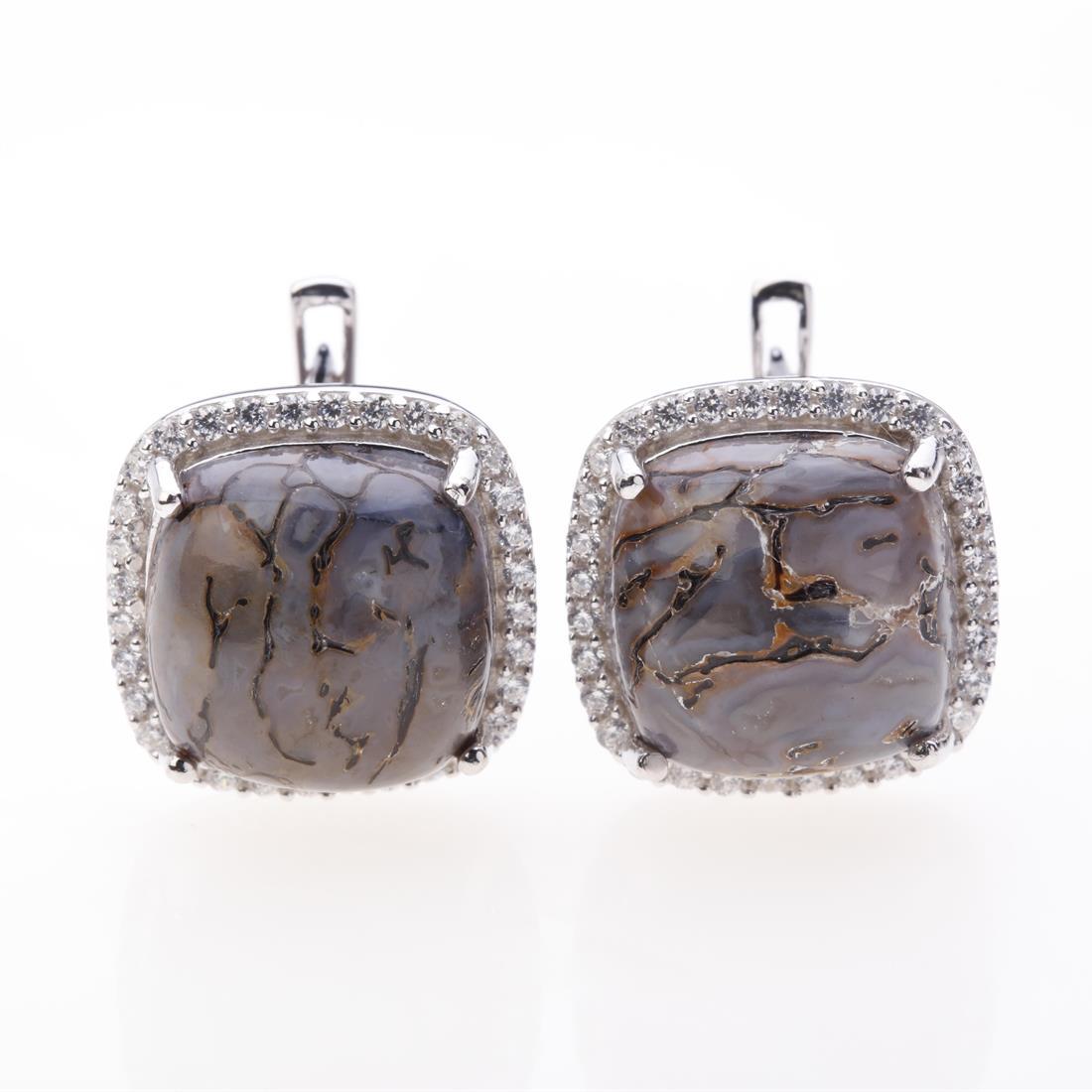 12Mm Dinosaur Bone Cabochon Zircon Earrings: 12Mm Dinosaur Bone Cabochon Zircon Earrings • Metal: Sterling Silver • Stone: 12 Mm Cushion Dinosaur Bone&White Zircon • Dimension:15X15 Mm •Total Weight: 7.88 Mm •Finish