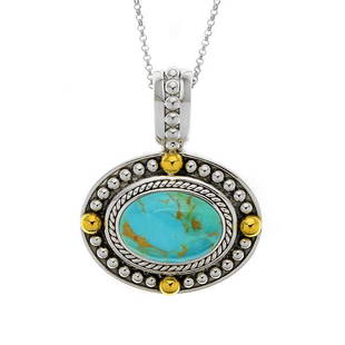 Sterling Turquoise Gold Bead Accent Pend w/chain: Metal: Sterling silver with 14K yellow gold over sterling silver accents Stone Information: One oval 20 x 14mm compressed and stabilized turquoise cabochon Setting Type: Bezel Measurements: Pendant: