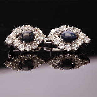 Sterling Silver Star Sapphire & Zircon Earrings: Sterling Silver Star Sapphire & Zircon Earrings • Metal: Sterling Silver • Stone: (2)8X6Mm-Star Blue Sapphire &White Zircon • Dimensions: 21.53X13.35 Mm • Total Weight: 6.61