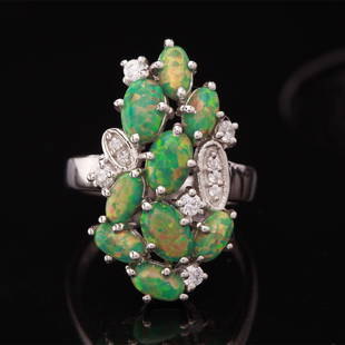 Size5.25Sterling Fire Green Syn Opal & Zircon Ring: Size 5.25 Sterling Fire Green Syn Opal & Zircon Ring • Metal: Sterling Silver • Stone: Natural Green Opal& White Zircon • Width: 24.1 Mm • Total Weight: 4.01 Grs •