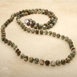 38 Inch Sterling Silver Knotted Rhyolite Necklace: 38 Inch Sterling Silver Knotted Rhyolite Necklace • Metal: Sterling Silver • Stone: Rhyolite • Width: 8.77 mm • Total Weight: 67.8 grams • Closure: Lobster Claw •