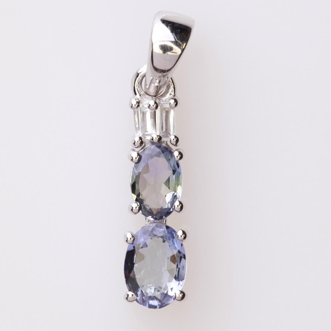 Sterling Silver Bio Tanzanite & Zircon Pendant: Sterling Silver Bio Tanzanite & Zircon Pendant • Metal: Sterling Silver • Stone: Bio Tanzanite&White Zircon • Dimensions: 5.1X24.8 Mm • Total Weight: 1.62 Grs • Finish: R