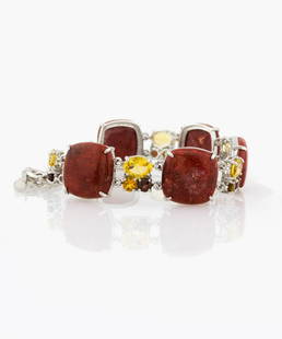 Silver Coral & Multi Gemstone Toggle Bracelet: 925 Sterling Silver Pangea Mines impressive toggle bracelet is crafted with large cushion shaped coral in individual stations alternating with three-stone stations in a gleaming sterling silver settin