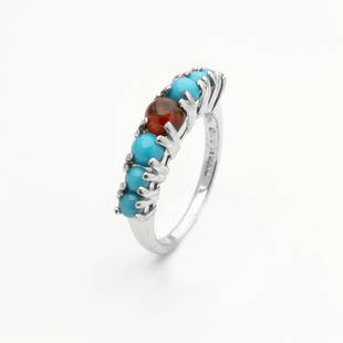 Silver Turquoise & Garnet Graduated Ring-SZ 7: Silver Turquoise & Garnet Graduated Ring-Sz 7 • Metal: Sterling Silver • Stone: Turquoise & Garnet • Width: 5.34 Mm • Total Weight: 3.3 Grs • Finish: Rhodium