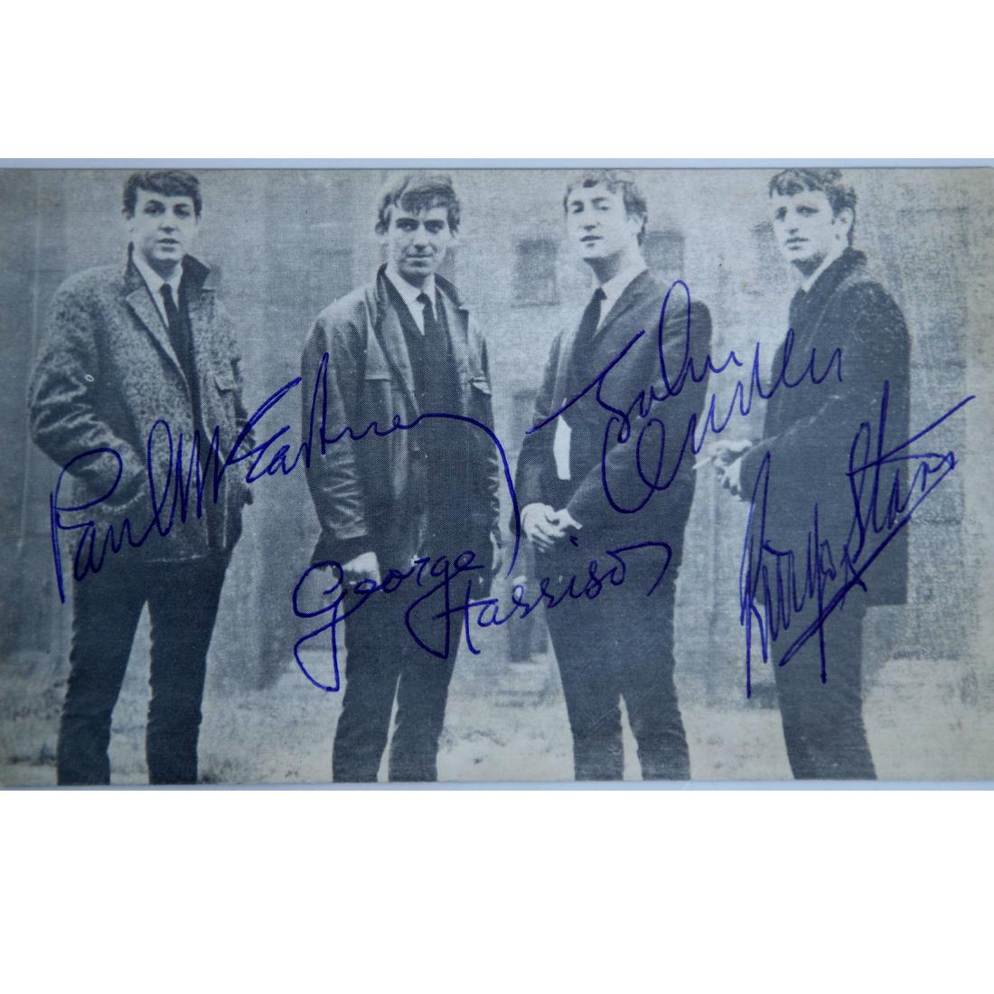 The Beatles Signed Black & White Postcard: The Beatles (1960-1970) signed 3.25 x 5.25 Black and White 1964 Postcard of the Fab Four at the beginning of their fame. John Lennon, Paul McCartney, George Harrison and Ringo Starr all boldy signed i