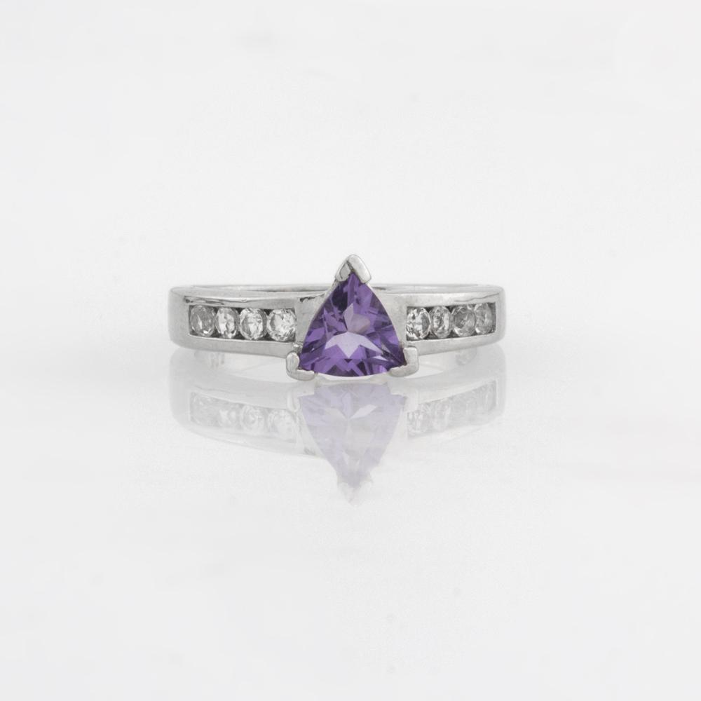 Sterling Silver Trillion Cut Amethsyt Ring-SZ 7: Metal: Rhodium over sterling silver Stone Information: Amethyst: One trillion shaped 7x7mm White Topaz: round cut 1mm Setting Type: Prong Country of Origin: Thailand