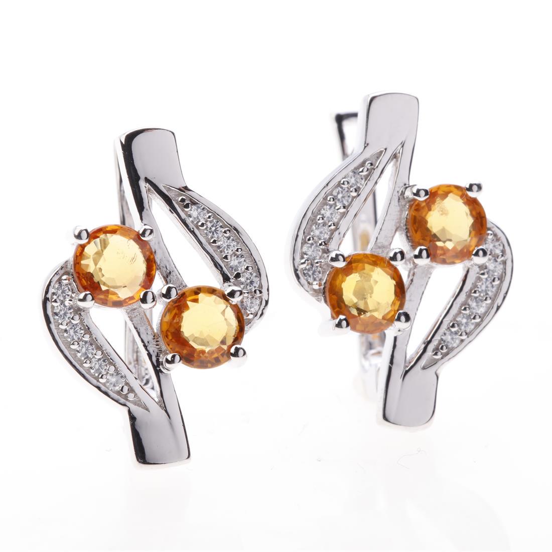 Orange Sapphire & Zircon Sterling Silver Earrings: Orange Sapphire & Zircon Sterling Silver Earrings • Metal: Sterling Silver • Stone: 5 Mm Rd Orange Sapphire&White Zircon • Dimension: 21X14.3 Mm • Total Weight: 6.28 Grams R