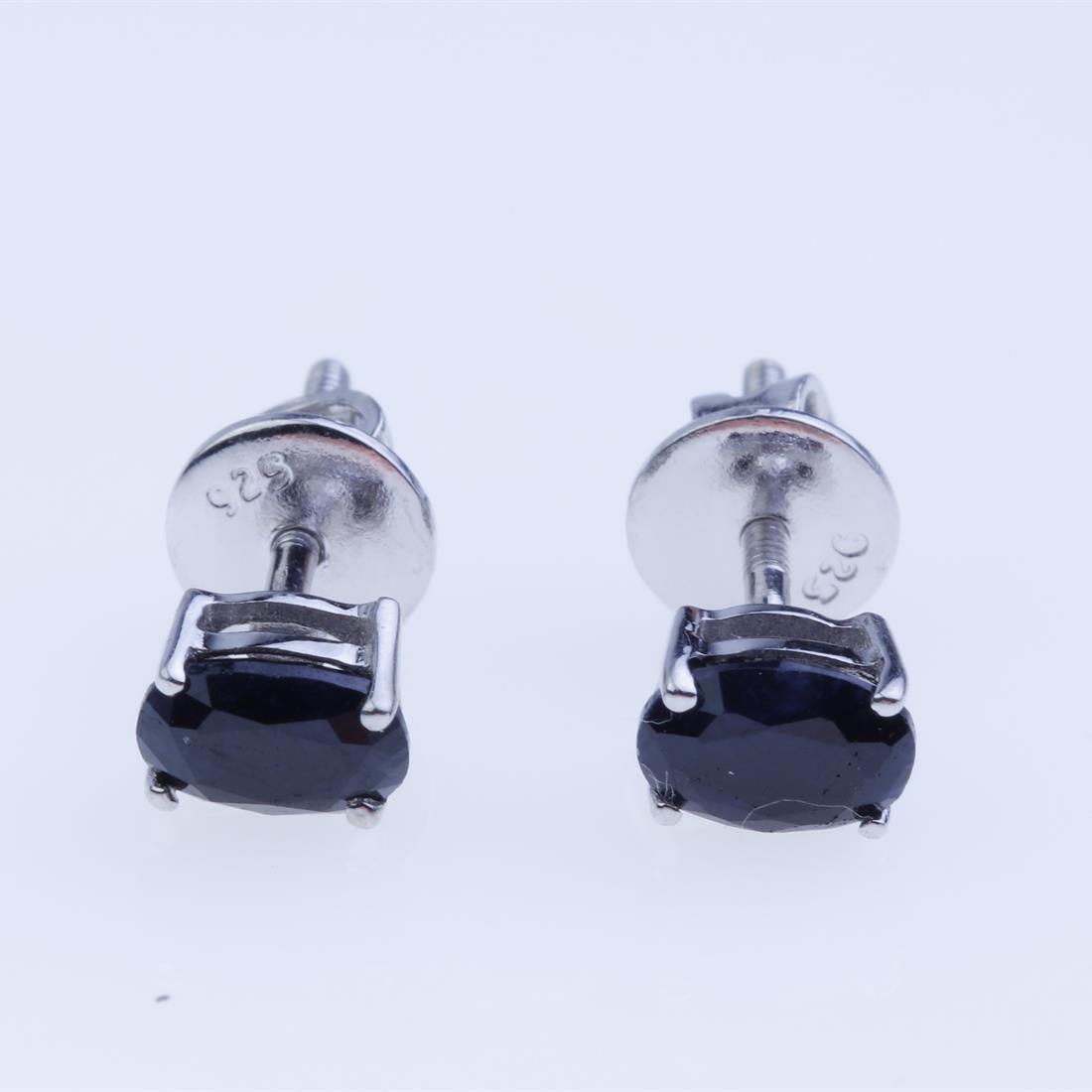 Lemon Topaz Silver Stud Earrings: Lemon Topaz Silver Stud Earrings • Metal: Sterling Silver • Stone: 6X4 Mm Ov Lemon Topaz • Dimension: 6X4 Mm • Total Weight: 1.22 Grams • Finish: Rhodium • Backing: