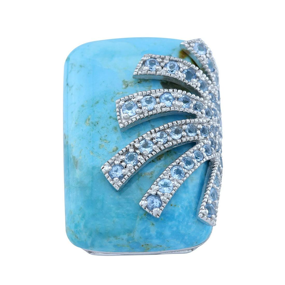 Silver Turquoise & Blue Topaz Overlay Ring-SZ 6: With vibrantly rich color and significant size, this 925 sterling silver ring evokes your love of finely edited yet bold fashion. One large cushion shaped Turquoise gemstone cabochon sits north-south