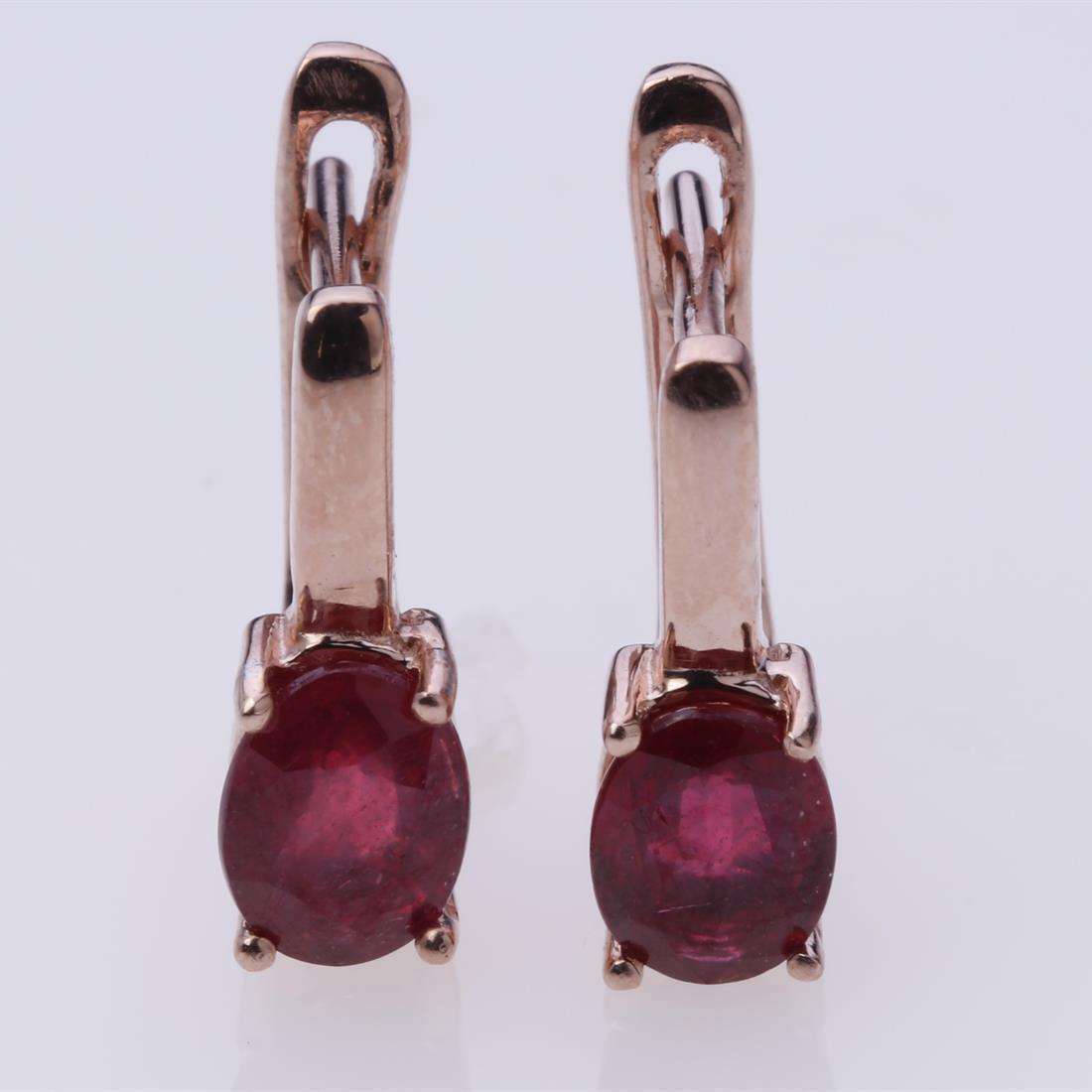 Rose Gold Over Silver Ruby Glass Field Earrings: Rose Gold Over Silver Ruby Glass Field Earrings • Metal: Sterling Silver • Stone: (2)7X5Mm-Ruby Glass Field • Dimensions: 4.8X14 Mm • Total Weight: 3.13 Grs • Backing: La