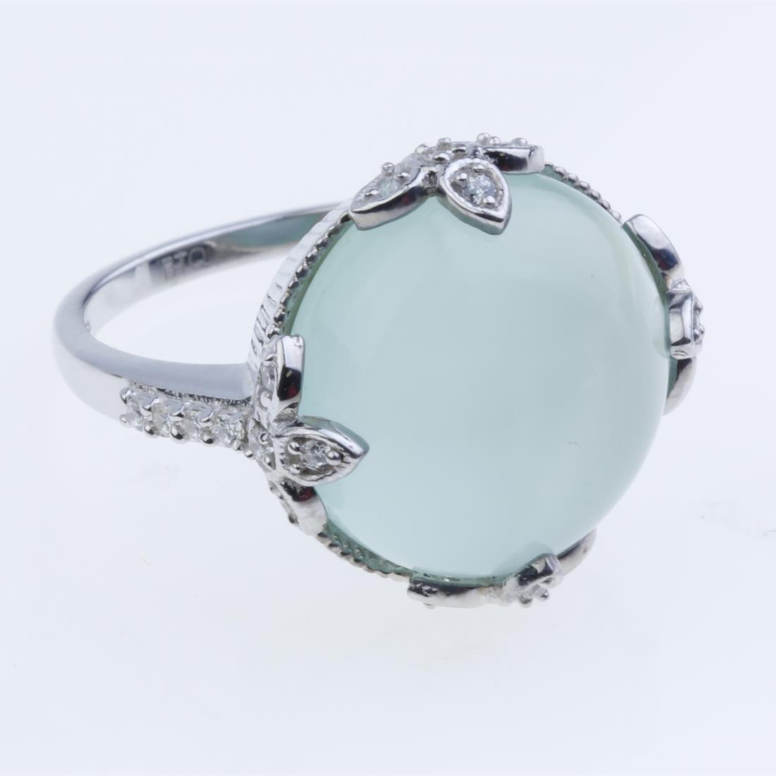 Size 8 Sterling Slv Aqua Chalcedony & Zircon Ring: Size 8 Sterling Slv Aqua Chalcedony & Zircon Ring • Metal: Sterling Silver • Stone: 15 Mm Aqua Chalcedony, White Zircon • Width : 17.9 Mm • Total Weight(Approx): 5.4 Grams R