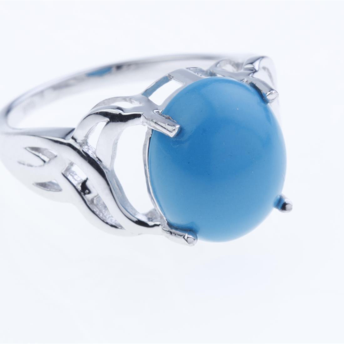 Size 9 Sterling Silver Syn Blue Turquoise Ring: Size 9 Sterling Silver Syn Blue Turquoise Ring • Metal: Sterling Silver • Stone: 12X10 Mm Oval Shape Synthetic Blue Turquoise • Width : 12.1 Mm • Appx Weight: 3.47 Grams •
