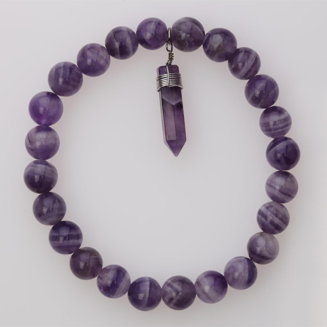 Amethyst Stretch Bracelet With Hex Charm: Amethyst Stretch Bracelet With Hex Charm • Stone: Amethyst • Hex Point Lenght : 22.8 Mm • Length: 7.75 Inches • Total Weight: 19.8 Grams
