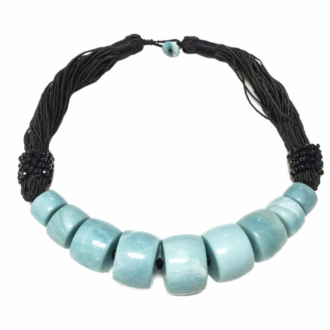 Amazonite Disc Corded Necklace 20": Amazonite Disc Corded Necklace 20" • Stone: Amazonite • Width: 29.2 mm • Length: 20 Inches • Total Weight: 191.3 grs