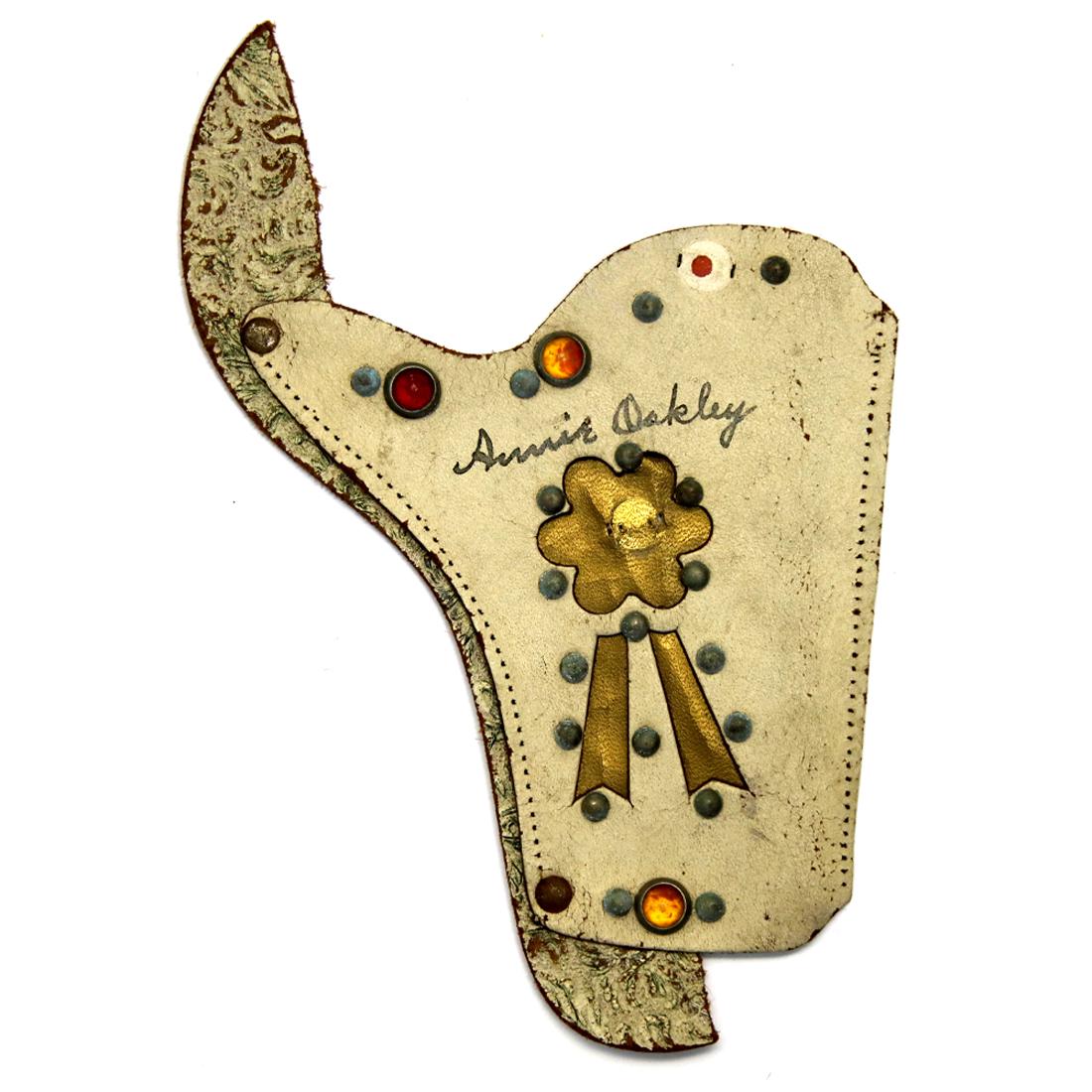 Annie Oakley Signed Leather Holster: This is a one of a kind piece. Annie Oakley (August 13, 1860 – November 26, 1926). Signed Revolver Holster. Leather holster outer part section, without belt. Clear signature signed in black ink.