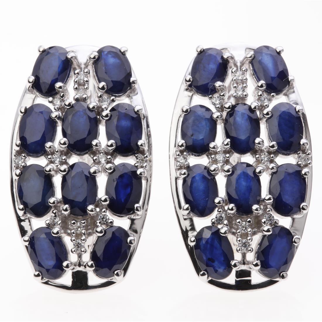 Sapphire & Zircon Sterling Silver Earrings: Sapphire & Zircon Sterling Silver Earrings .Metal: Sterling Silver .Stone: 6X4Mm Ov Blue Sapphire&White Zircon .Dimension: 28.8X16.1 Mm .Appx Weight: 11.35 Grams .Finish: Rhodium .Backing: French Clip