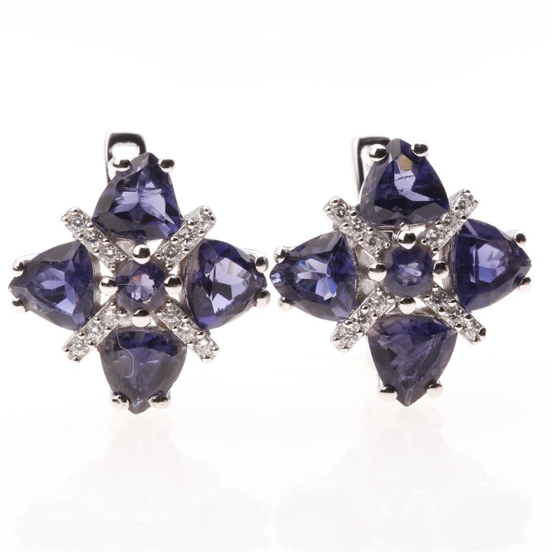 Trillion Iolite & Zircon Silver Earrings: Trillion Iolite & Zircon Silver Earrings • Metal: Sterling Silver • Stone: 5 Mm Iolite&White Zircon • Dimension: 14.8X14.8 Mm • Total Weight: 4.87 Grams • Finish: Rhodium