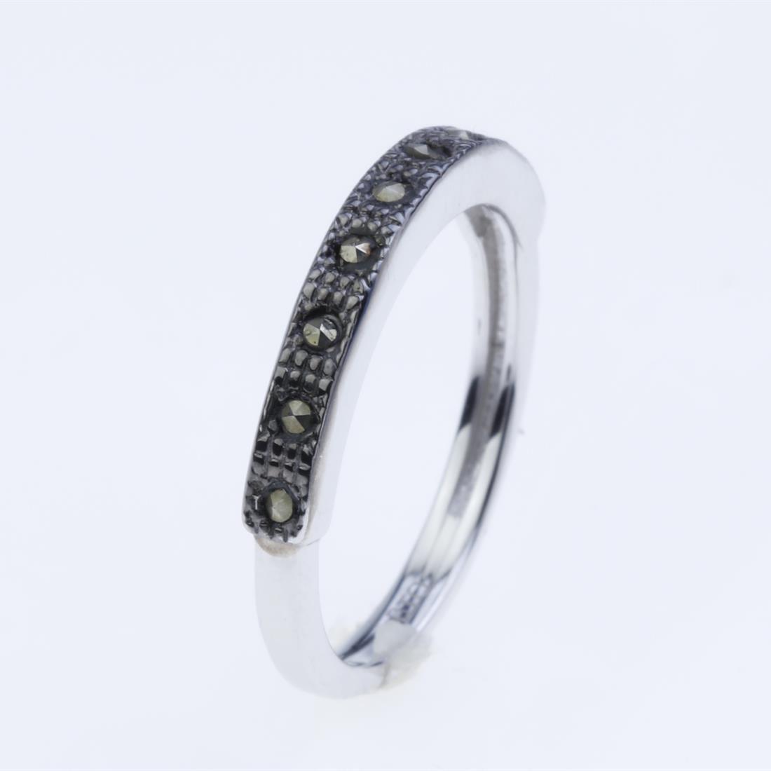 Size 7.5 Sterling Silver Marcasite Band Ring: Size 7.5 Sterling Silver Marcasite Band Ring • Metal: Sterling Silver • Stone: Marcasite • Width : 3.0 Mm • Appx Weight: 2.42 Grams • Finish: Rhodium