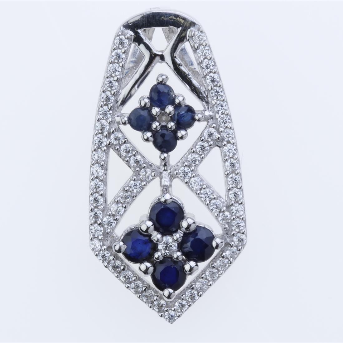 Sterling Silver Sapphire & White Zircon Pendant: Sterling Silver Sapphire & White Zircon Pendant • Metal: Sterling Silver • Stone: 2,3 Mm Rd Blue Sapphire&White Zircon • Dimension: 26.7X13.4 Mm • Total Weight: 3.18 Grams R