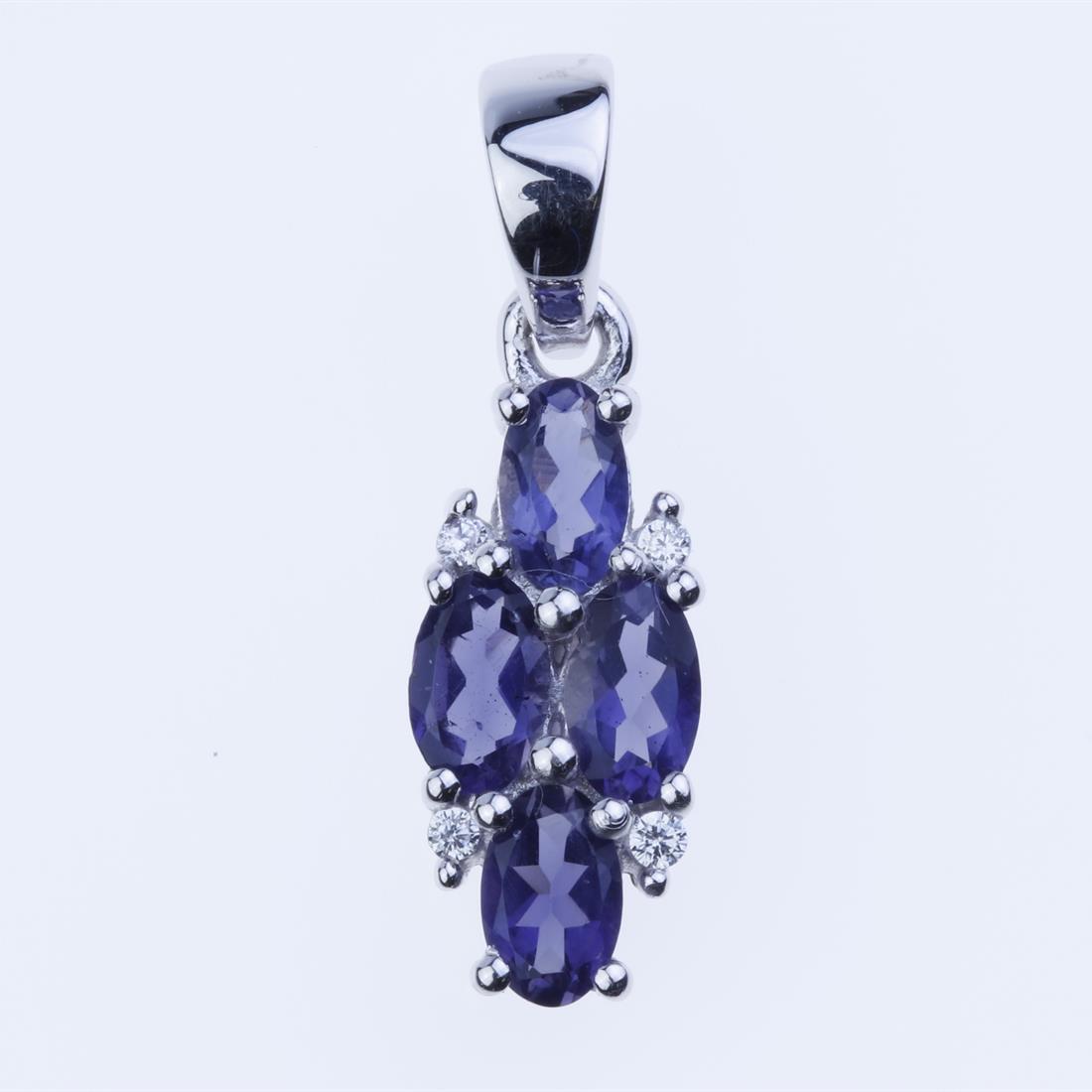 Iolite & White Zircon Sterling Silver Pendant: Iolite & White Zircon Sterling Silver Pendant • Metal: Sterling Silver • Stone: 5X3 Mm Oval Iolite,Zircon • Dimension : 22.2X6.5 Mm • Total Weight: 1.45 Grams • Finish: R