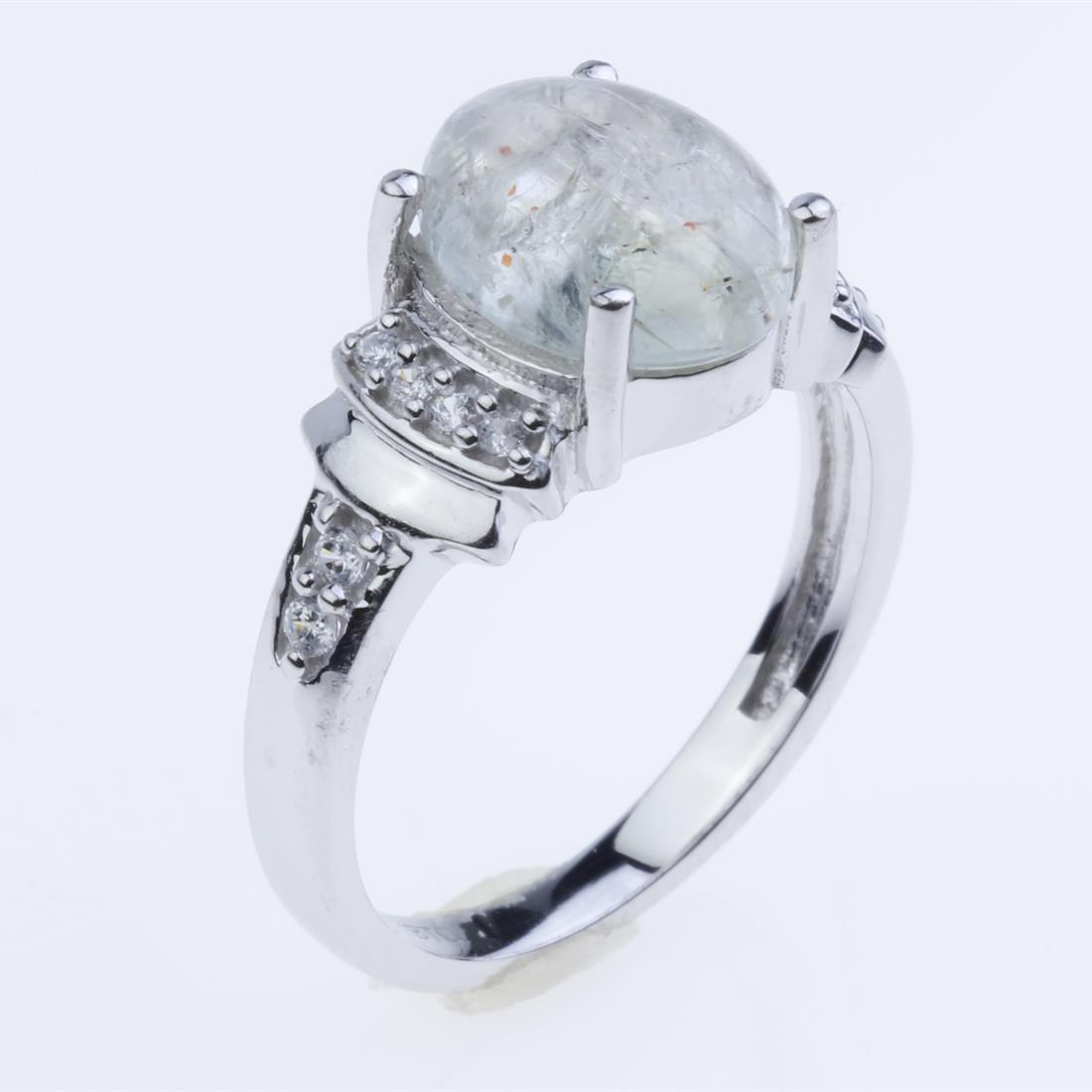 Sz 7 Green Sunstone & Zircon Sterling Slv Ring: Sz 7 Green Sunstone & Zircon Sterling Slv Ring • Metal: Sterling Silver • Stone: 10X8Mm Cab Sunstone, Zircon • Width : 10 Mm • Appx Weight: 3.47 Grams • Finish: Rhodium