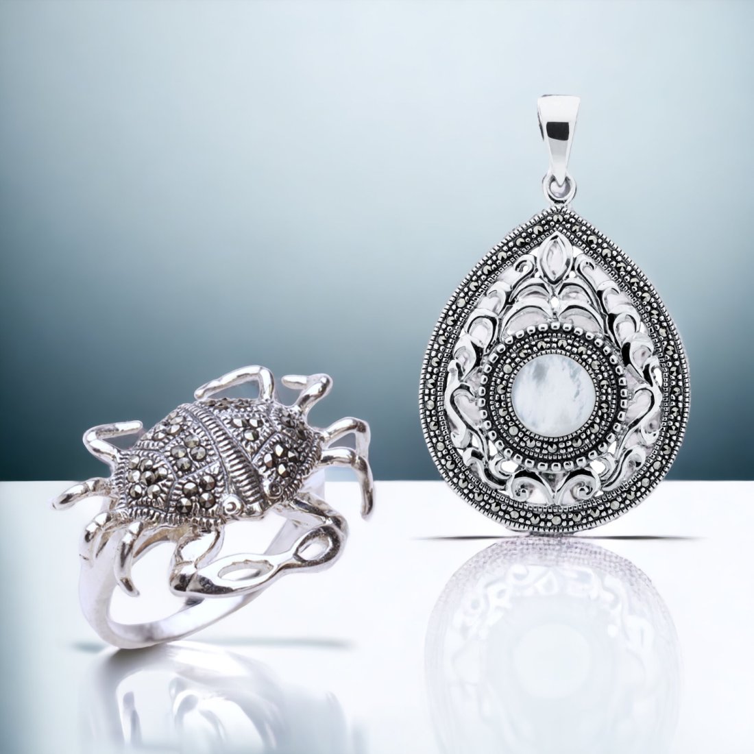 Nautical Elegance Marcasite Jewelry Set: Embrace the coastal charm with this nautical-inspired jewelry set. The sterling silver crab ring, adorned with shimmering marcasite, is a unique statement piece in size 8. Complementing the ensemble i