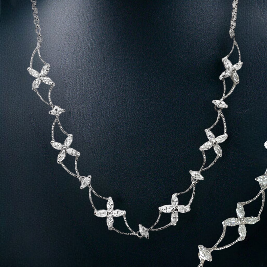 Sterling Silver Designer Necklace: Adorn your neckline with timeless elegance wearing our Sterling Silver CZ Necklace, measuring 17 inches with a 3-inch extension for adjustable length. Each cubic zirconia stone is meticulously set in 