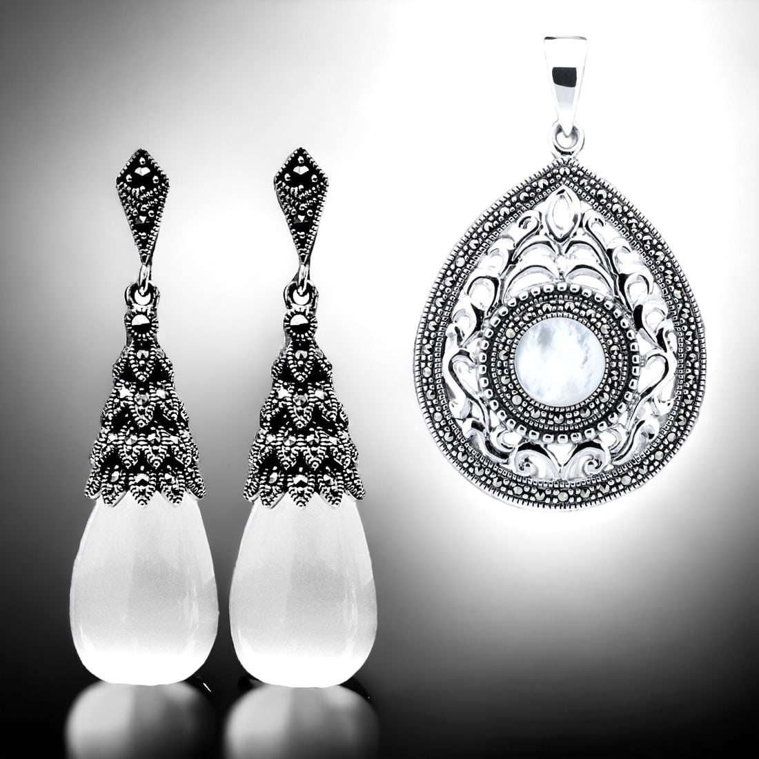 Timeless Marcasite Sterling Silver Duo: Indulge in the enchanting allure of this Sterling Silver Marcasite Collection, featuring meticulously crafted pieces adorned with Marcasite. The earrings, intricately detailed with shimmering marcasit
