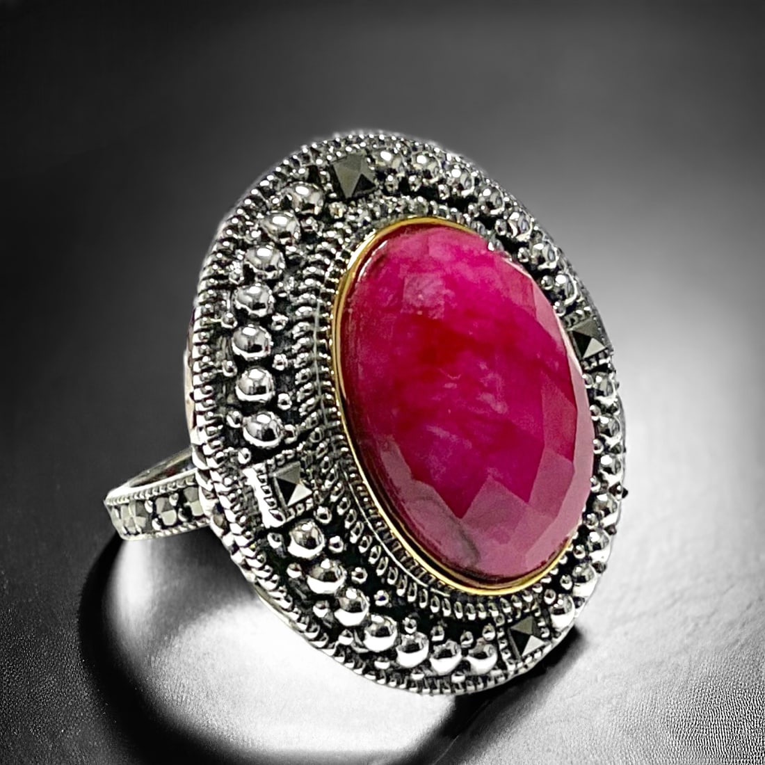 14K and Sterling Silver Cherry Quartz & Marcasite Ring: Indulge in the rich allure of this Sterling Silver and 14K Gold Ring featuring Cherry Quartz and Marcasite. The vibrant Cherry Quartz centerpiece, set in a size 9 ring, radiates warmth and sophisticat