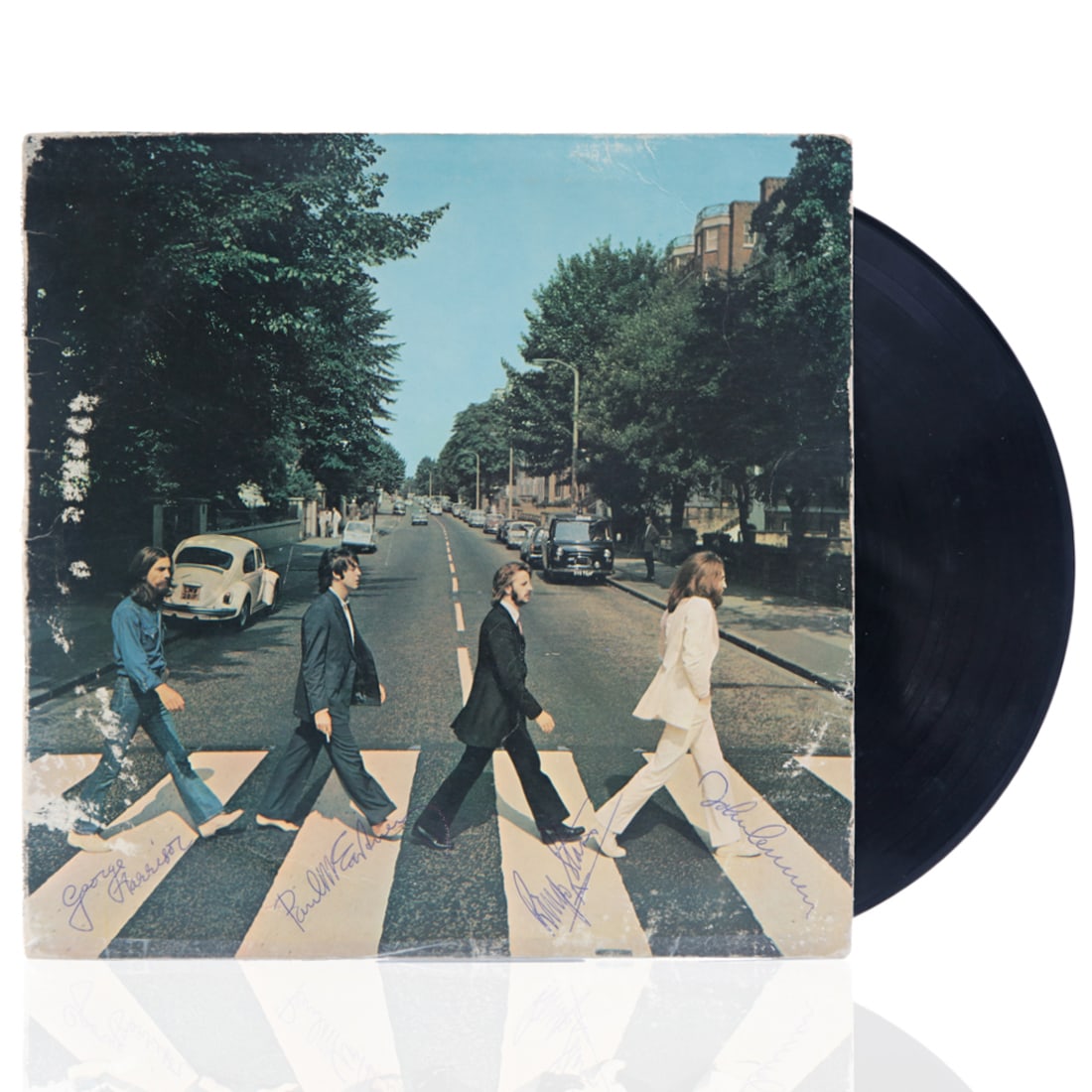 The Beatles band members blue ink signatures on an "Abbey Road" Album (1 of 7)