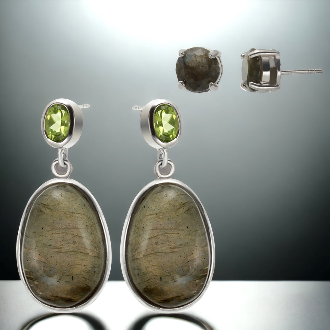 Luminous Labradorite & Peridot Earrings: Radiate elegance with this sterling silver earring duo featuring captivating labradorite and peridot gemstones. The stunning combination of iridescent labradorite and the vibrant green hue of peridot