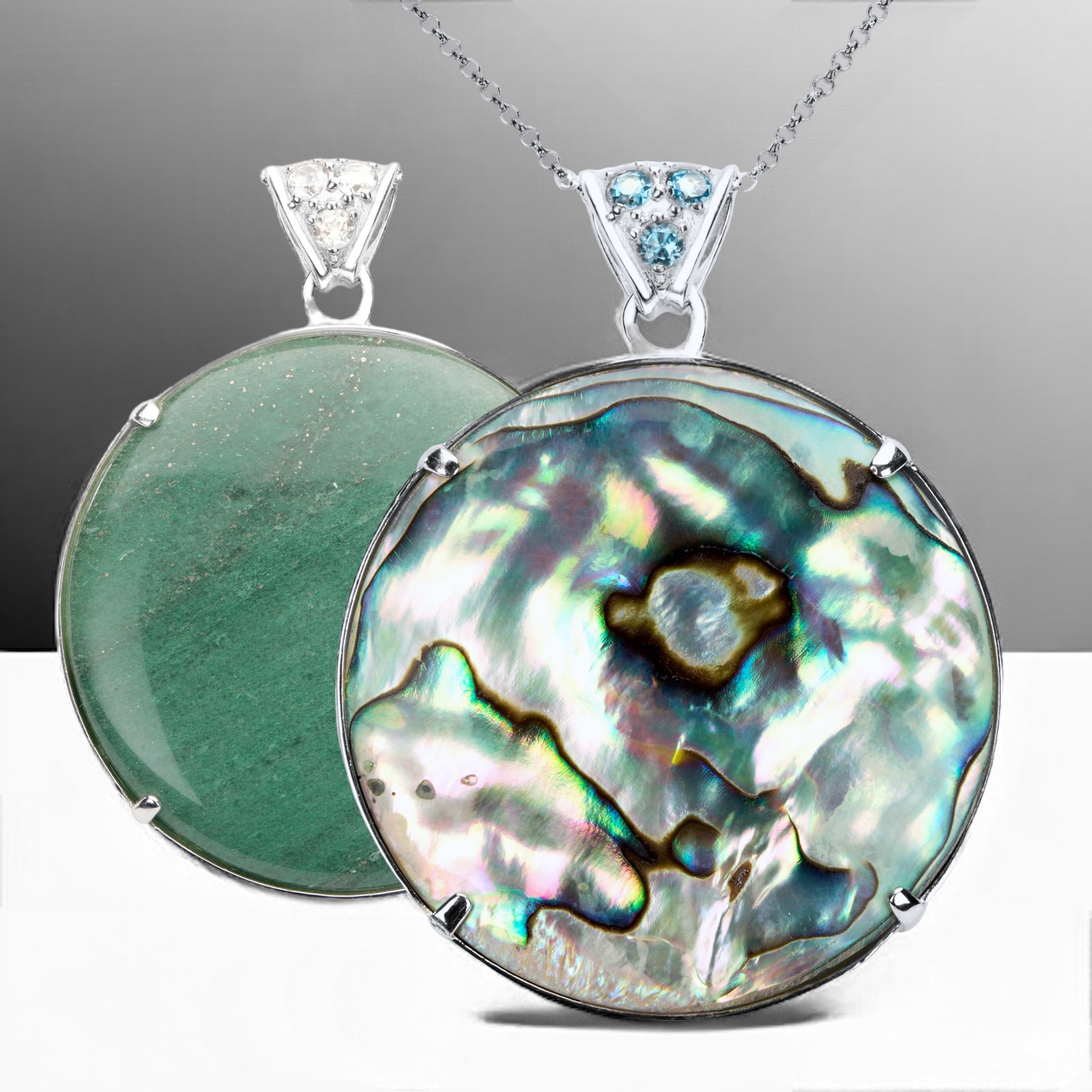 Abalone & Green Adventurine Reversible Pendant crafted in Sterling Silver.: 40 mm Round Centerstones: Abalone & Green Adventurine Product Details Item: Pendant Metal: Sterling Silver Gemstone: Side 1: Abalone with Swiss Blue Topaz Adventurine Side 2: Green Adventurine & White