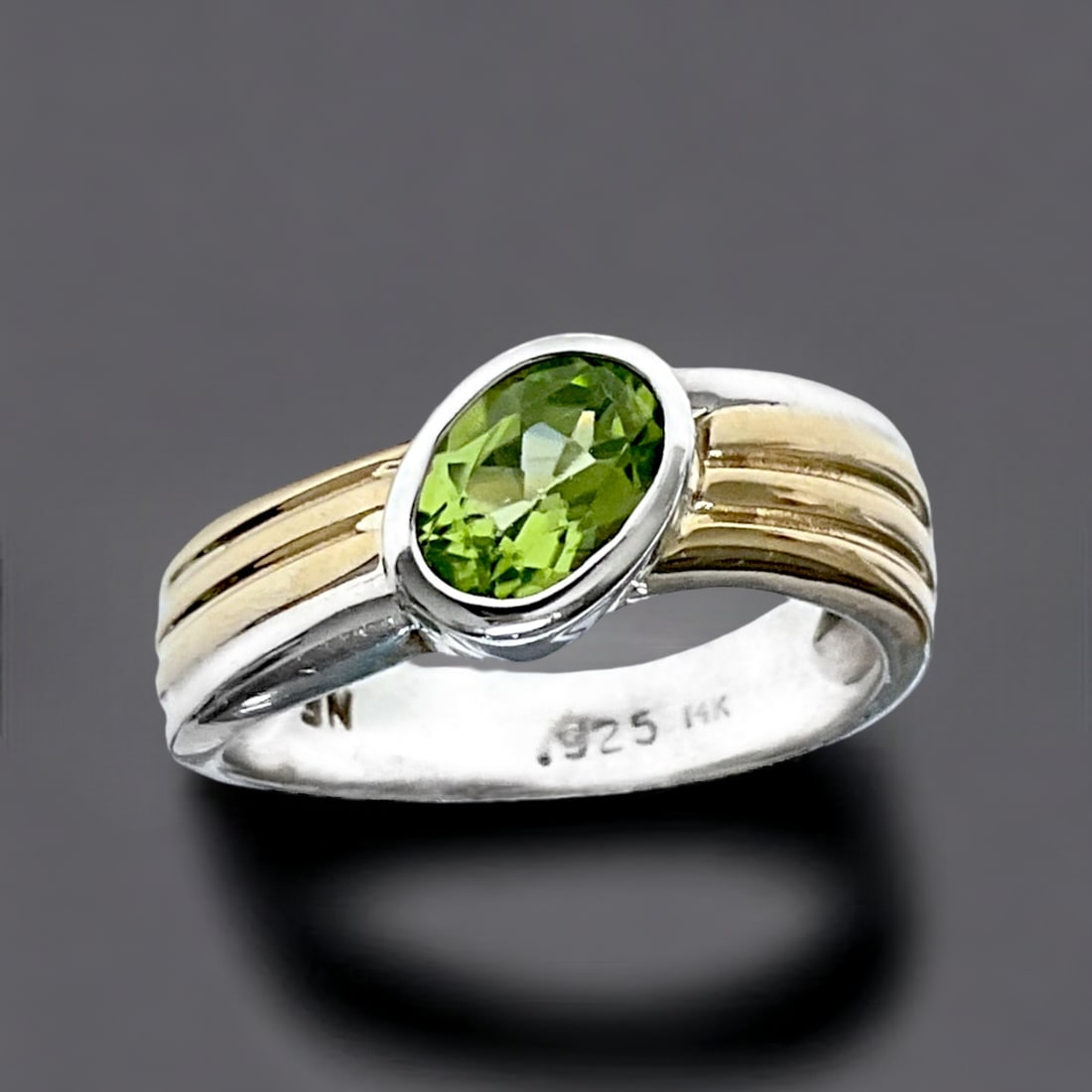 Elegant 14K Gold & Sterling Silver Peridot Ring with an oval Peridot Center stone (1 of 1)