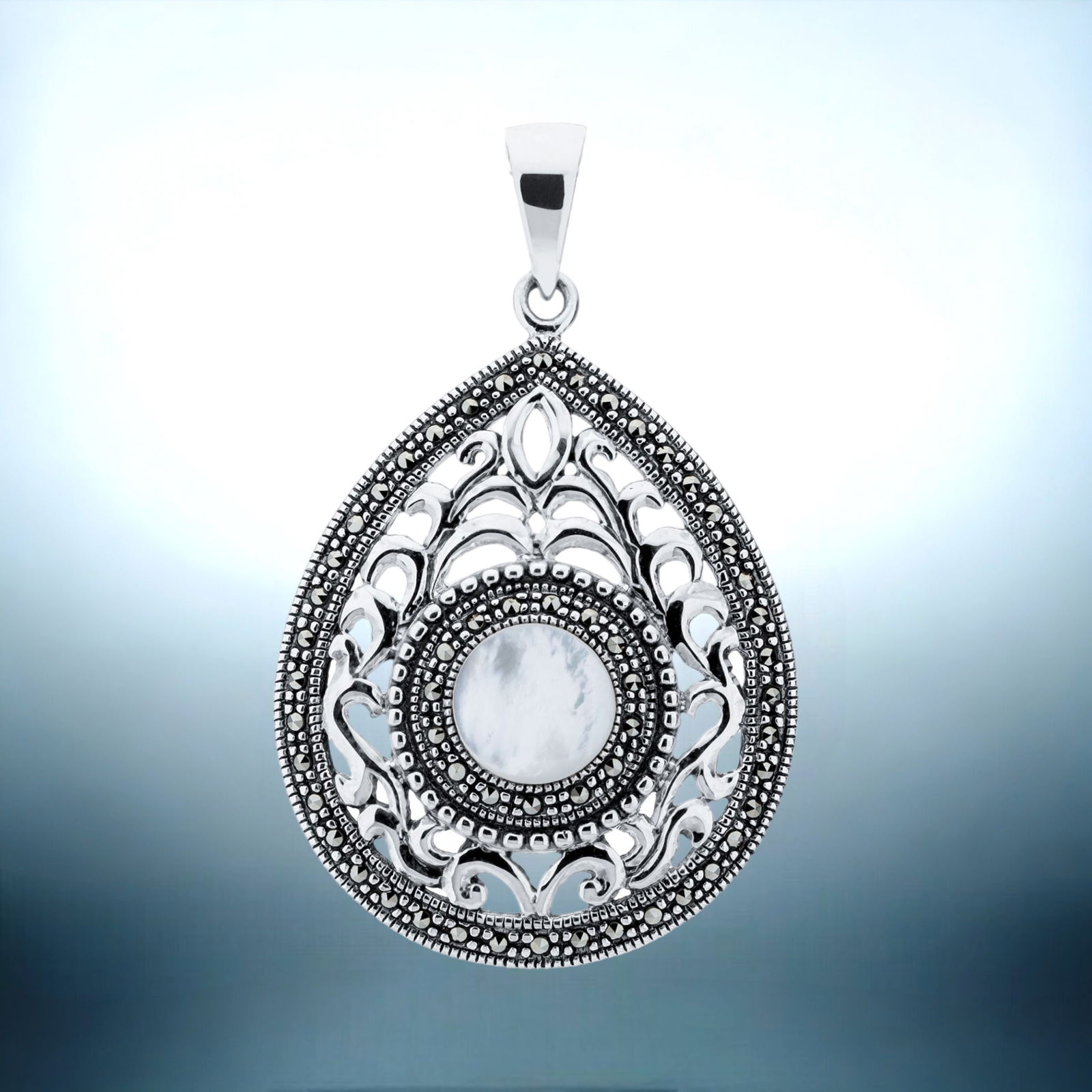 Filagree design Sterling Silver Pendant with a Mother-of-Pearl Centerstone and adorned with (1 of 1)