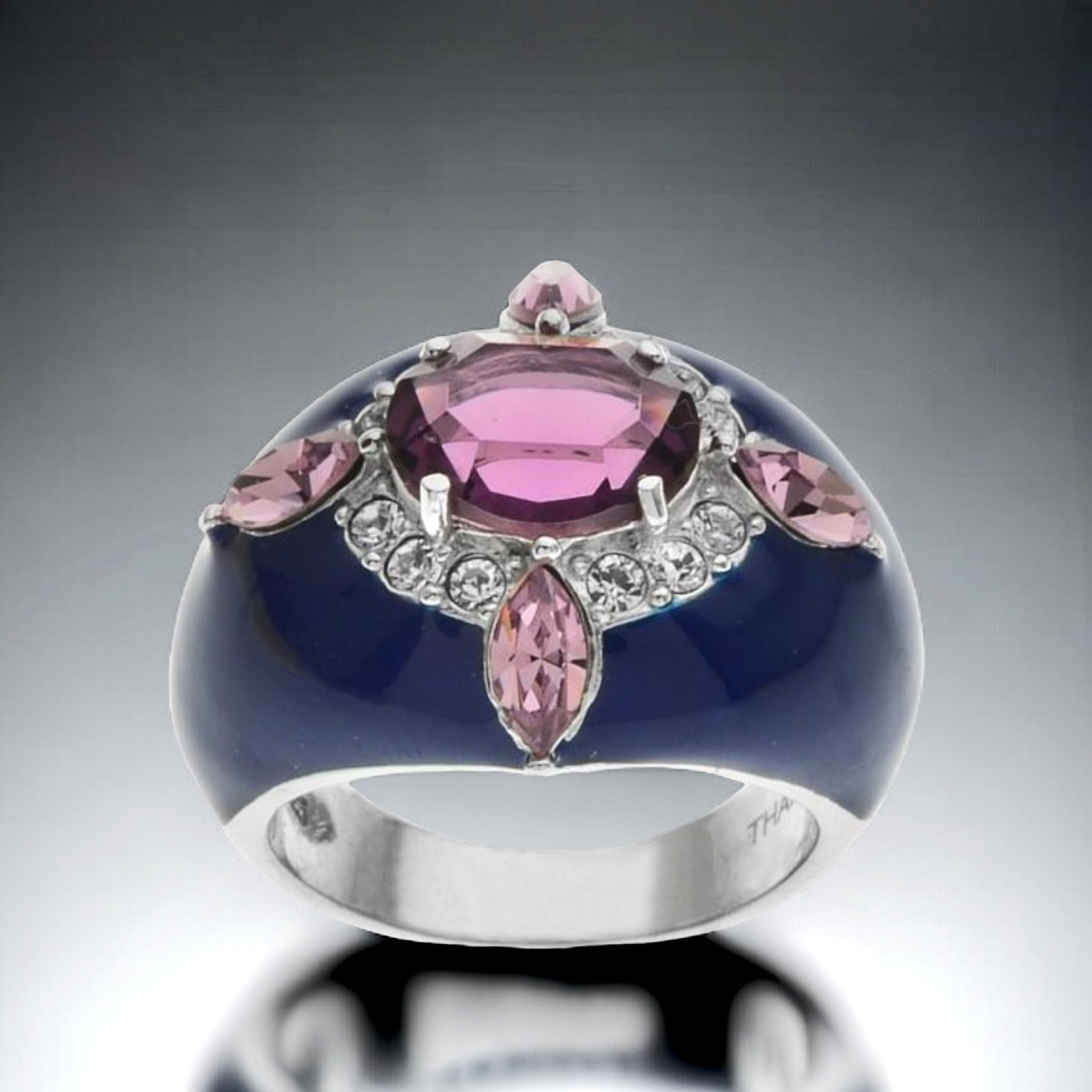 Sterling Silver Enamel Dome with Swarovski elements Ring - Size 5: Product Details Item: Ring Metal: Sterling Silver Gemstone: Pink & White Swarovski Elements Approximate Measurements: Width: 20 mm Ring Size: Size 5 Chain Length: Not Applicable Chain Me
