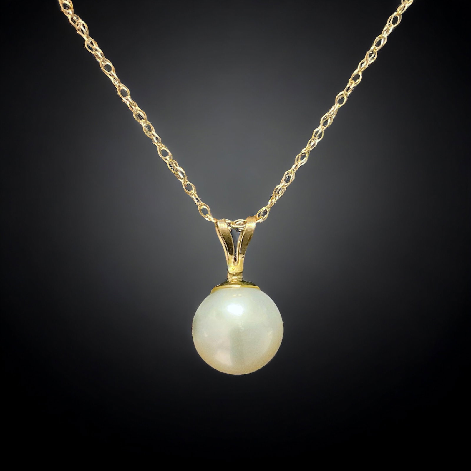10K Solitaire Pearl Pendant with Gold Chain: Product Details Item: Pendant Metal: 10K Gold Gemstone: Pearl Approximate Measurements: 12.7 mm X 7.1 mm Ring Size: Not Applicable Chain Length: 18" Chain Metal: 14K Gold