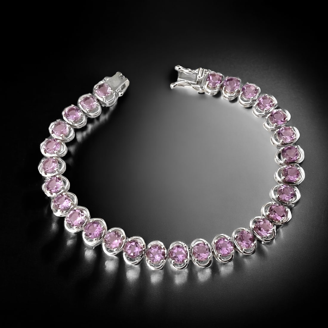 28 exquisite Amethyst Gemstones set on this 7.25" Sterling Silver Bracelet (1 of 1)