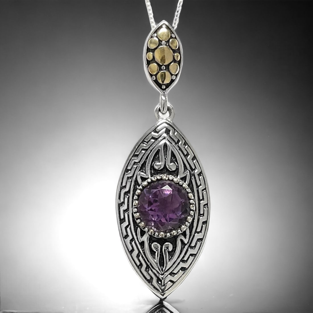 Enchanting Amethyst Pendant set in Sterling Silver and detailed Filagree design (1 of 1)