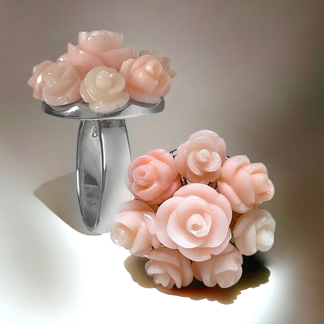 Exquisite Carved Coral Rosette Sterling Silver Ring Size 7: Product Details Item: Ring Metal: Sterling Silver Gemstone: Coral Approximate Measurements: Width: 23.4 mm Ring Size: Size 7 Chain Length: Not Applicable Chain Metal: Not Applicable