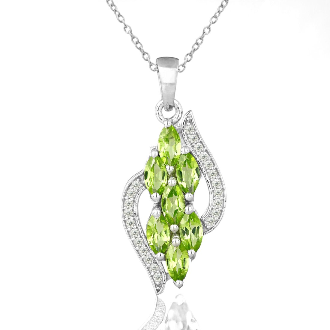 Sterling Silver Peridot and Whit Zircon Pendant: Product Details Item: Pendant Metal: Sterling Silver Gemstone: Peridot & White Zircon Approximate Measurements: 34 mm X 13 mm Ring Size: Not Applicable Chain Length: 18" Chain Metal: Ste