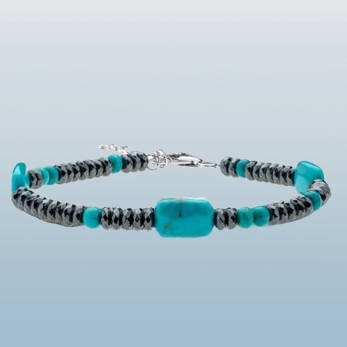 Turquoise & Hematite 7.5” Sterling Silver Bracelet: Product Details Item: Bracelet Metal: Sterling Silver Gemstone: Turquoise & Hematite Approximate Measurements: Length 7.5"+2" Ring Size: Not Applicable Chain Length: Not Applicable Chain